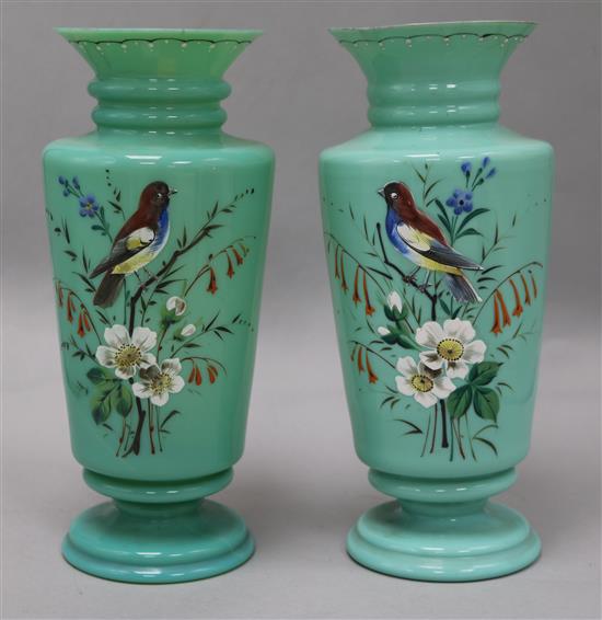 A pair of Victorian pale blue glass enamelled vases
